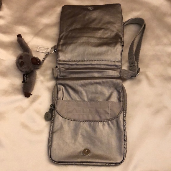 Kipling NWELDORADO Smooth Silver Metallic Crossbody With Monkey Key Chain NWT - Picture 10 of 16